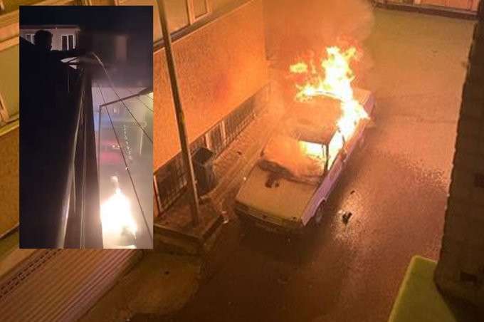 Bursa&rsquo;da  Yanan Arabaya Balkondan Pet Şişeyle M&uuml;dahale!